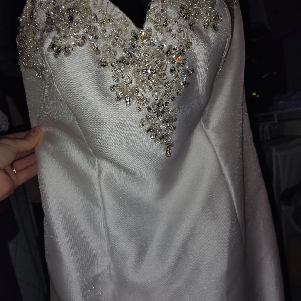 Elegant White Gown with Beaded Embellishments